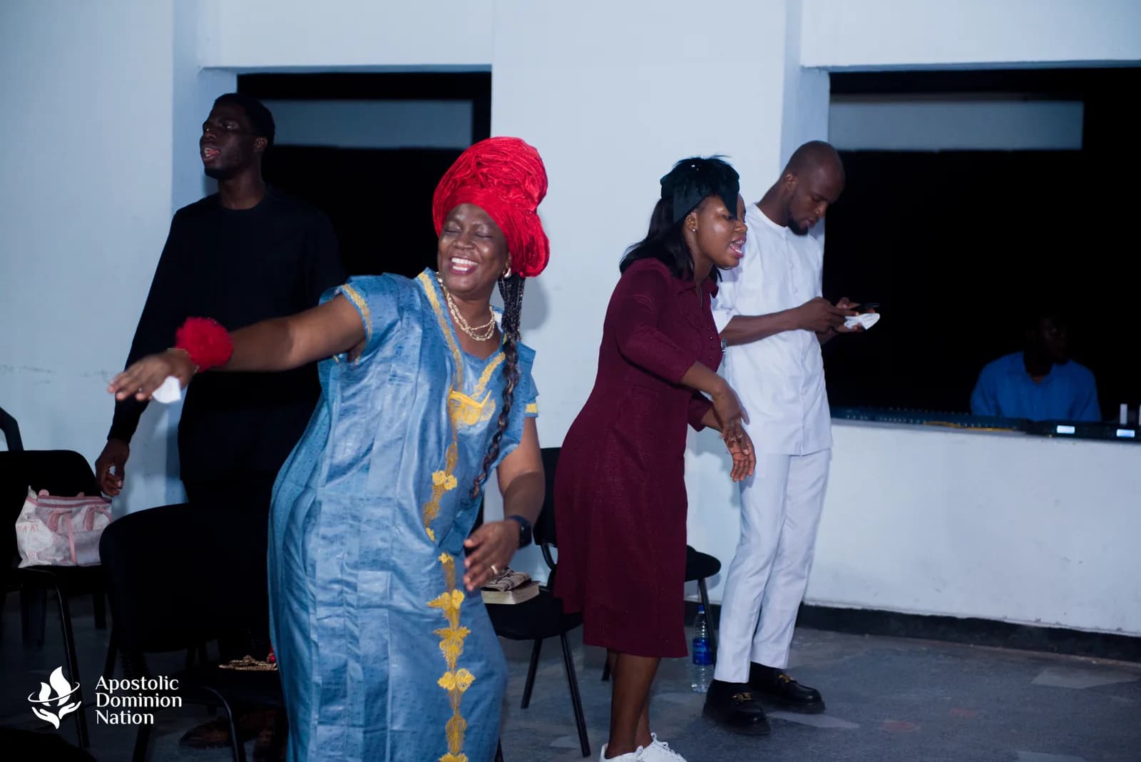 Members dancing during service