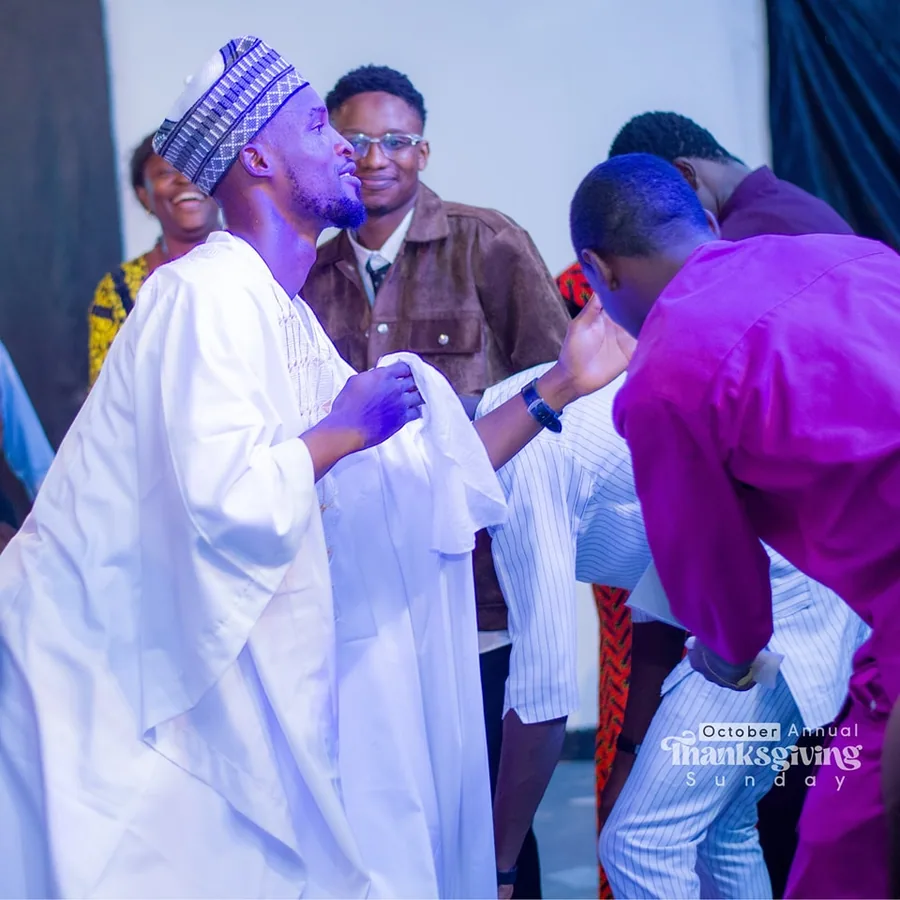 Congregation worshipping during a church service